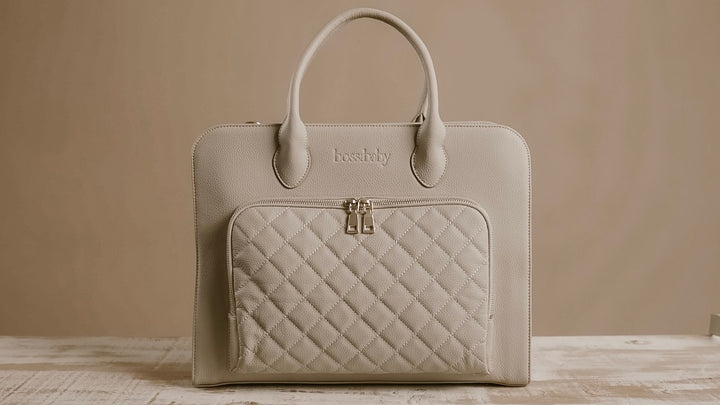 The Structured Tote in First Light, a warm taupe, seen from the front